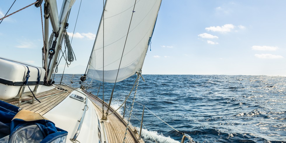 Yacht sail in the Atlantic ocean at sunny day cruise